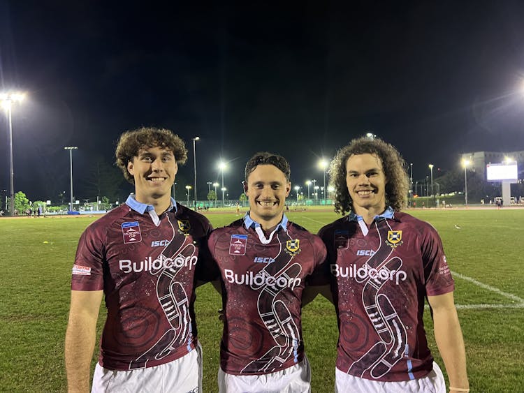 The Oates brothers (from left) Chace, BJ and Kye wearing UQ's 2024 Indigenous jersey