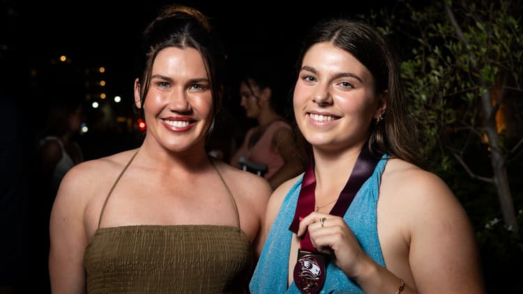 Taleah Ackland presented with the Charlotte Caslick Medal by the sevens superstar herself. Photo: Brendan Hertel Photography