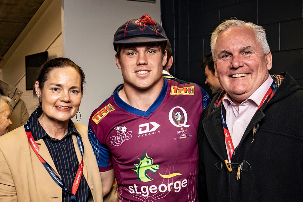 Mac Grealy with his parents after his Super Rugby and Queensland debut. 