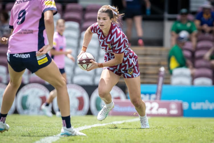 Reds winger Caitlin Urwin in UQ's distinctive pyjama kit for sevens