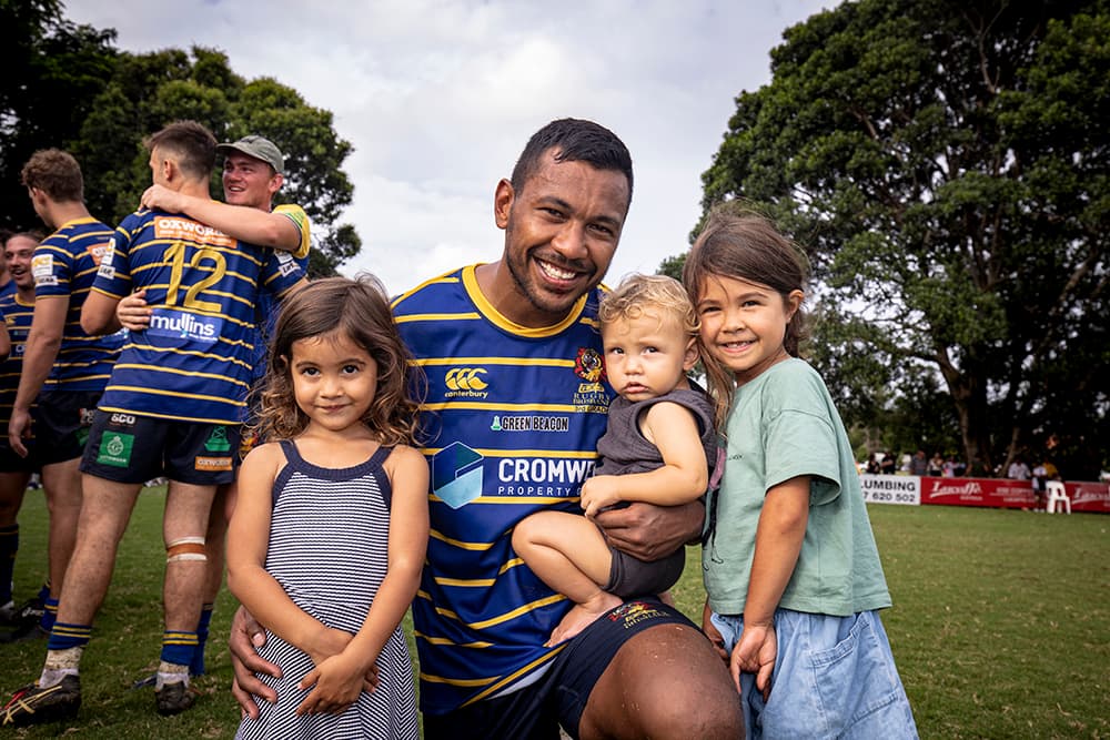Aidan Toua with his three children after Easts win over Gordon. Photo Credit: Brendan Hertel/QRU 