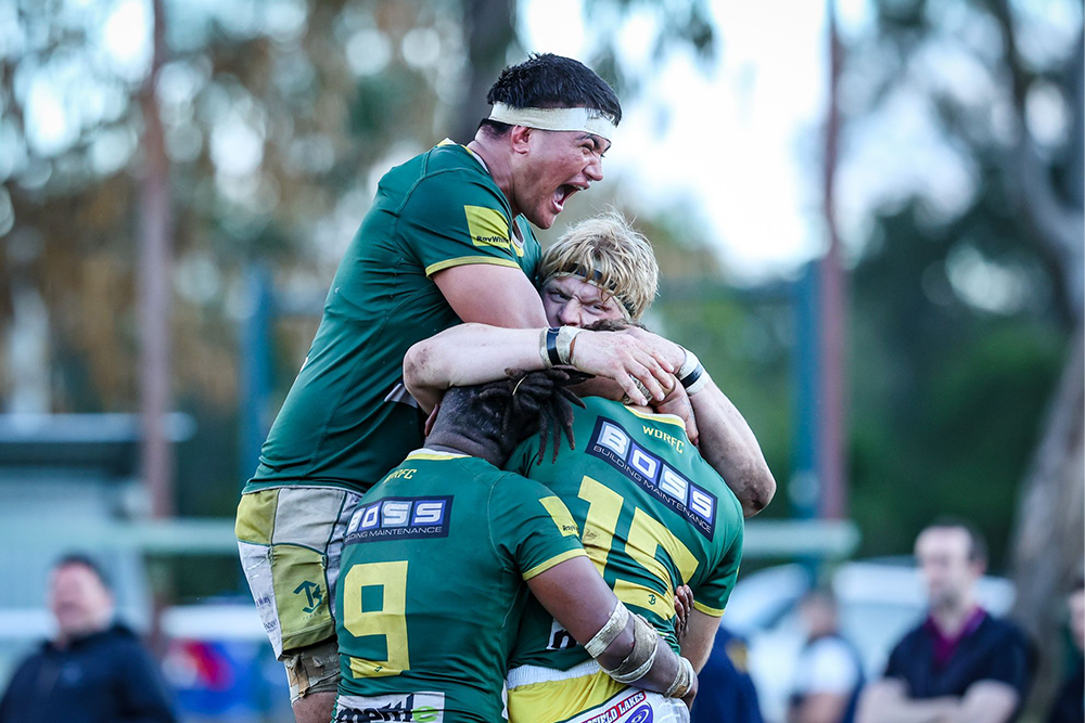 Wests celebrate an incredible victory at Yoku Road. Photo: QRU Media/Brendan Hertel.