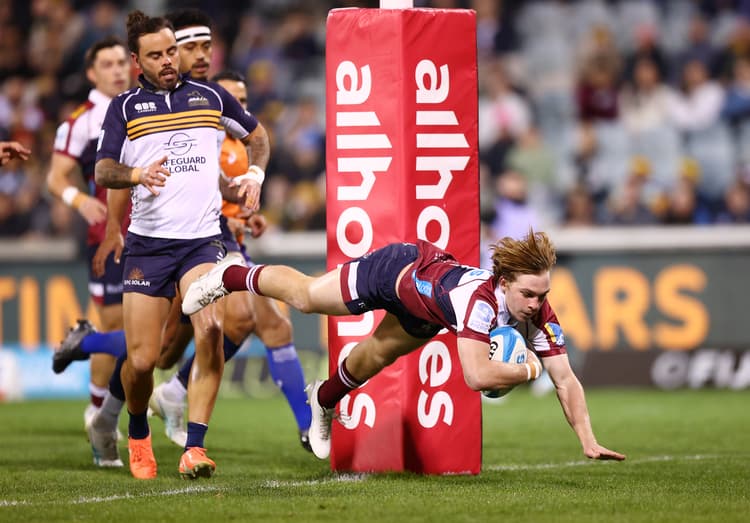 Reds winger Tim Ryan plunges over for his try in Canberra. Photo: Mark Nolan, Getty Images