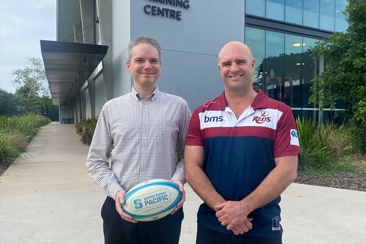 Welcome to the Reds: Professor Dimitri Perrin (left) with Sam Cordingley, Queensland Reds General Manager, Professional Rugby