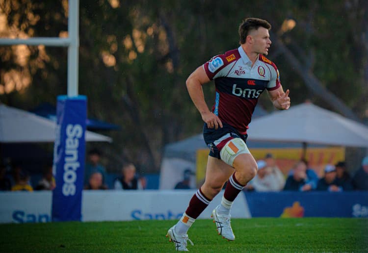 Reds centre Isaac Henry in action against the NSW Waratahs at the Santos Festival of Rugby.
