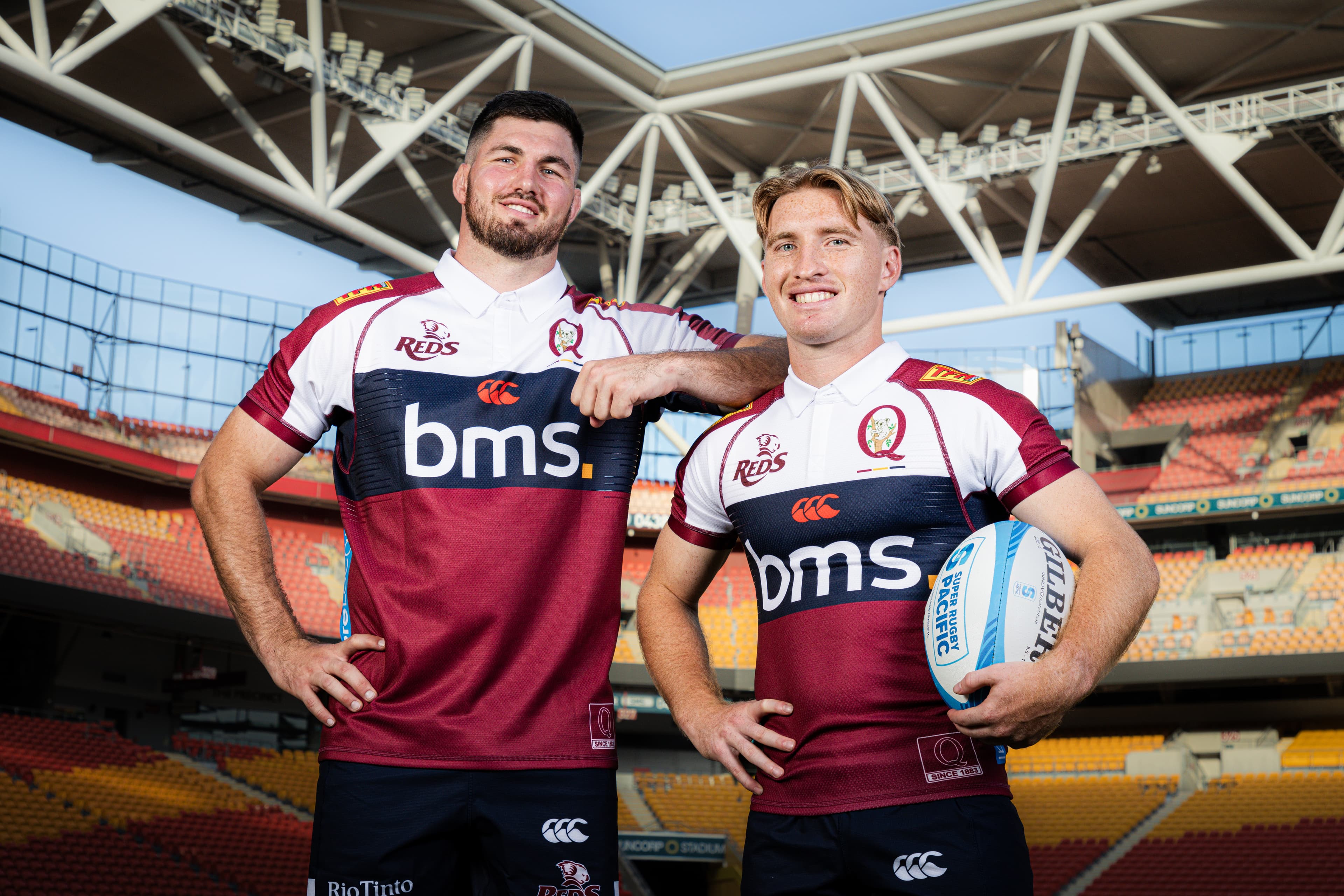 Join the action at Suncorp Stadium in 2025 with Reds co-captains Liam Wright (left) and Tate McDermott