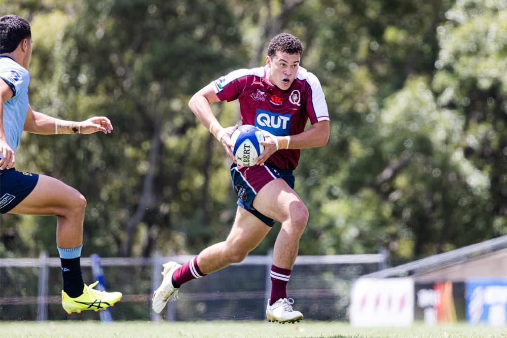 Impressive Reds U16s centre Tai Taka on the charge in the grand final. Image: Brendan Hertel/Rugby Australia 