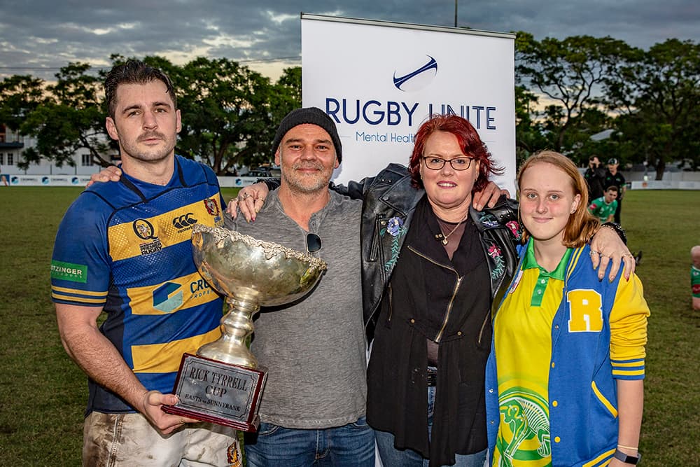 Easts captain Tom Milosevic with Rick Tyrrell's family. 