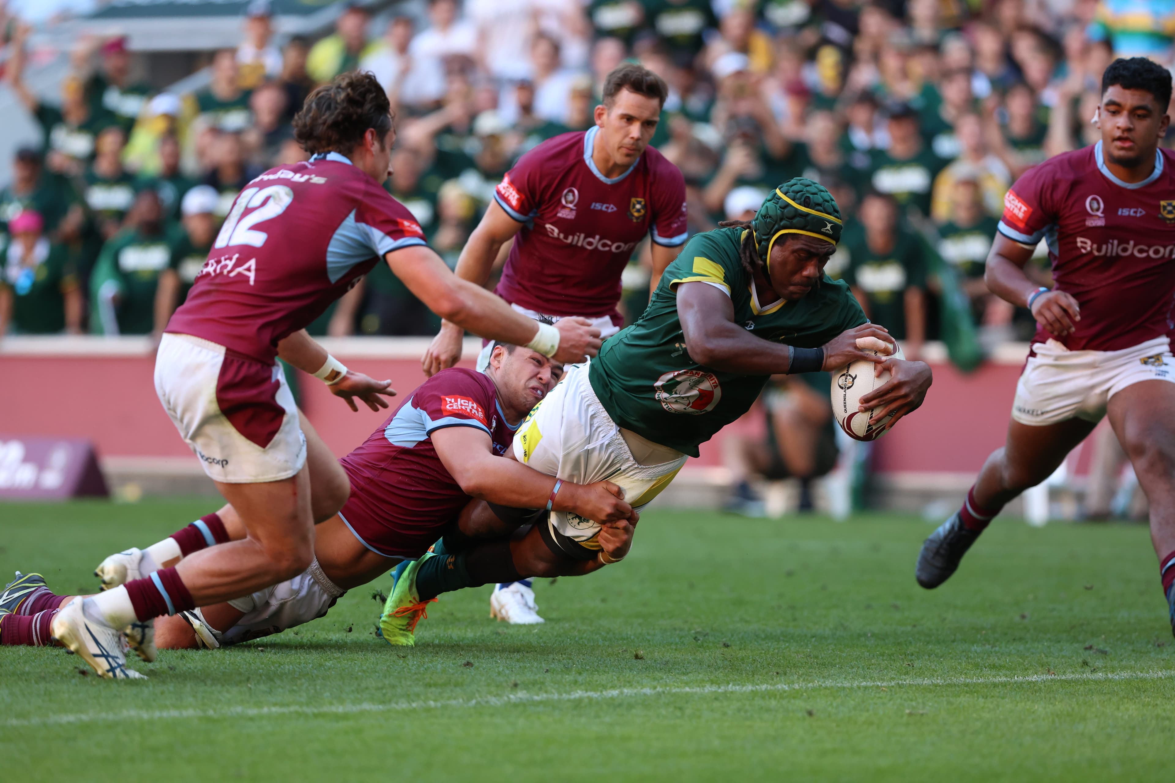 Man of the match Seru Uru crosses for a try. Photo: QRU Media/Brendan Hertel. 
