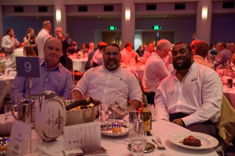 Niltech Consulting’s Nilesh Singh (centre) with Reds prop Peni Ravai (right) at the Season Launch Long Lunch.