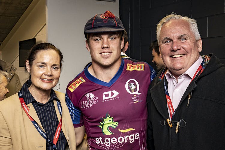 Mac Grealy with his parents after his Super Rugby and Queensland debut. 