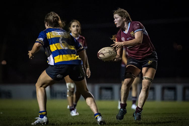 Noosa product Tess Evans in action for University of Queensland.